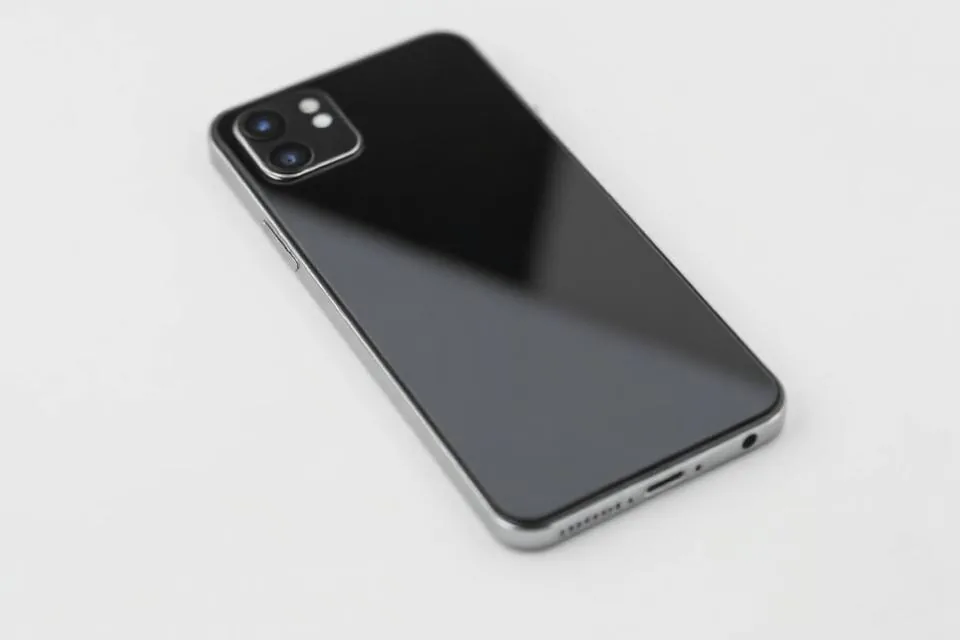 Illustrative close-up of a smartphone rear body panel for cosmetic condition checks