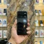 Redmi K80 5G Obsidian Black back panel held in hand in mobile store